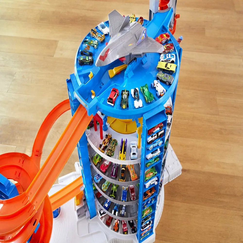 Hot Wheels Track Set With 4 1, 64 Scale Toy Cars, Super Ultimate Garage, Over 3 Ft. Tall