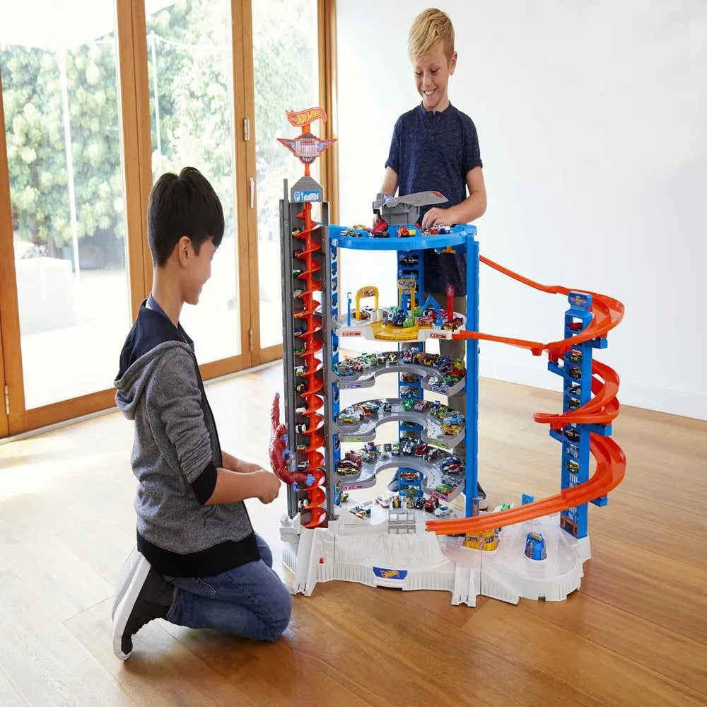 Hot Wheels Track Set With 4 1, 64 Scale Toy Cars, Super Ultimate Garage, Over 3 Ft. Tall